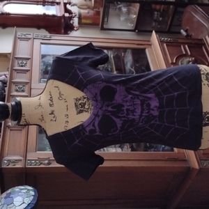 Thread short sleeve tee black size small with purple skull on front.